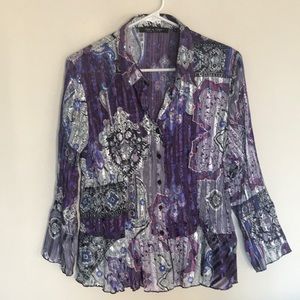 Beautiful dressy peplum style blouse. Size L.